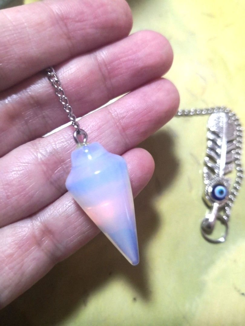 Crystal Pendulums (Category: Precious Stones) located in Singapore. Submitted by poppyx (Listing ID 1291161921, Image 3). Description: Brand new crystal pendulums. Gemstones are aventurine and opalite. Small and cute, suitable for travel. For fortune telling or finding answers to your questions. Aventurine has an obvious inclusion, $9 Opalite (many sheens), $10 Mail only, +$2. Add box for $1, else will be sent in a bubbled envelope. Buy both at 2