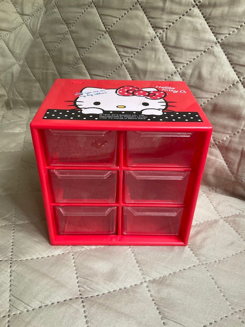 Hello Kitty Desk Storage Organizer (Category: Storage Boxes & Baskets) located in Cavite. Submitted by springbreeze.ph (Listing ID 1291076624, Image 1). Description: • with scratches • 6 compartments DM for inquiries.