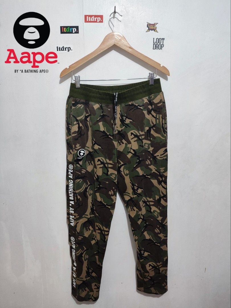 Aape camo track pants (Category: Joggers) located in Rizal. Submitted by lootdrop (Listing ID 1291273930, Image 1). Description: Aape cotton camo track pants (Legit) Size M Dimes W-30 to 36 L-39 Hem-7.5 CR- 9.5/10.