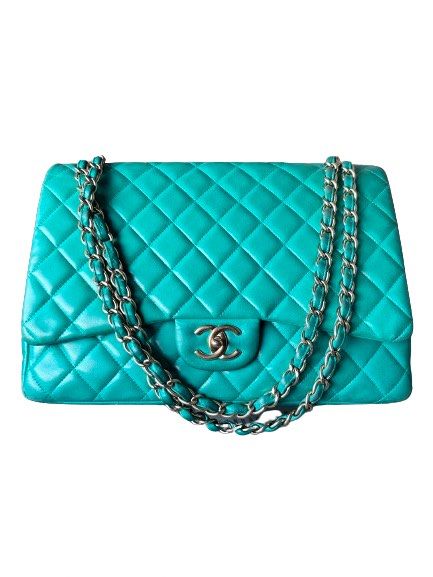 Authentic Chanel Maxi Lambskin Double Flap Bag (Category: Luxury Bags & Wallets) located in Rizal. Submitted by SummerPeaCloset (Listing ID 1291354962, Image 1). Description: Authentic Chanel Maxi Double Flap Bag With original dustbag Gold hardware Selling low for PHP 210k ‼️‼️ Color green Series 17 Can add entrupy for PHP 1,800 All our items are money back guaranteed authentic Layaway Terms and Conditions: - Upfront deposit of 20% of the item pr