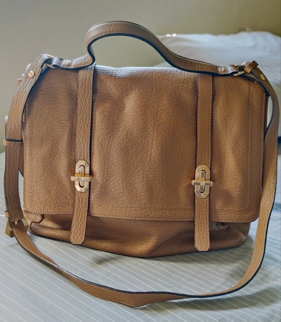 Bruno Magli Satchel Bag (Category: Luxury Bags & Wallets) located in Manila. Submitted by chegutz_ (Listing ID 1291257479, Image 1). Description: Bruno Magli Satchel Bag RFS: Too many bags, need to declutter Authenticity Guaranteed ‼️ Size: Large Please check photos for condition (Excellent and no signs of use) Tag na lang kulang to be considered as brand new 👍🏻 Hardwares & Genuine Leather 💯 Can ask for a reasonable discount.