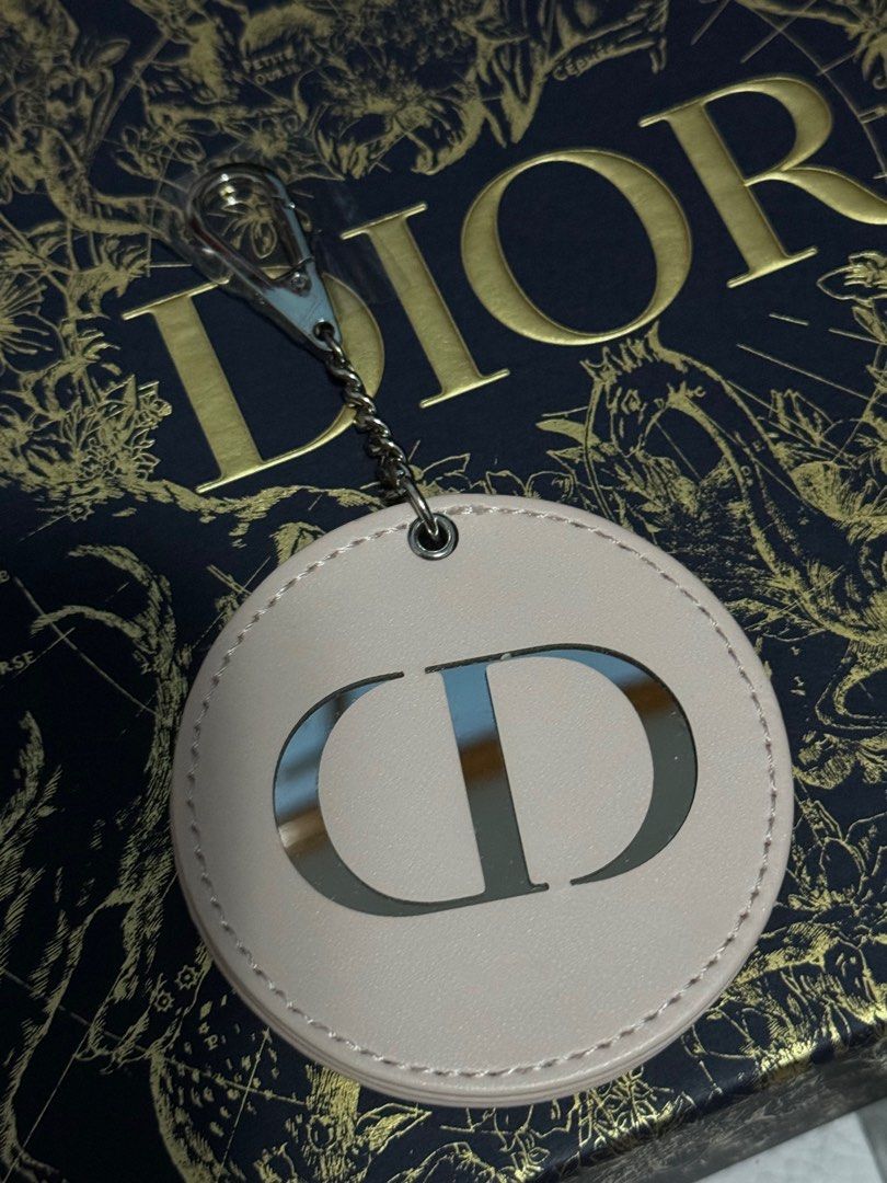 Dior Beauty Mirror keychain/ charm (Category: Luxury Accessories) located in Naga. Submitted by akimadison.ph (Listing ID 1291361560, Image 1). Description: Guaranteed authentic dior beauty mirror charm/keychain Unused Comes with plastic covers pa.