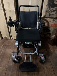 Electric wheelchair litt