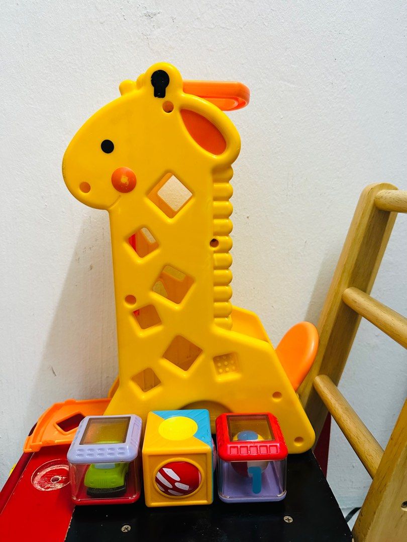 Fisher price cheap tumblin sounds giraffe