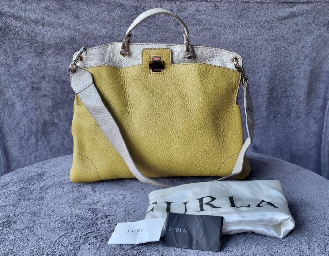 Furla Piper Lux Leather Satchel (Category: Luxury Bags & Wallets) located in Talisay. Submitted by parchiracollection (Listing ID 1291286336, Image 1). Description: *Complete inclusion *Has rubs in some areas of the bag but is barely noticeable. *plus SF *Please check detailed pictures before purchasing * This is a second-hand item, kaya wag po mag expect na BAGO *no to low ballers. The discounted price I'll give is the final price. *NO COD, NO C