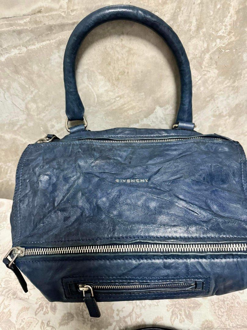 Givenchy Pandora (Category: Luxury Bags & Wallets) located in Batangas. Submitted by TaynsD (Listing ID 1291303525, Image 3). Description: Givenchy Pandora Medium Size Made from distressed leather No problem with hardware, zipper or handles Clean inside and out Comes with original dustbag RFS: Decluttering and too many bags in blue color.