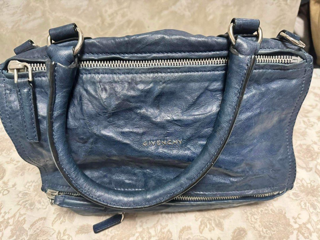 Givenchy Pandora (Category: Luxury Bags & Wallets) located in Batangas. Submitted by TaynsD (Listing ID 1291303525, Image 1). Description: Givenchy Pandora Medium Size Made from distressed leather No problem with hardware, zipper or handles Clean inside and out Comes with original dustbag RFS: Decluttering and too many bags in blue color.