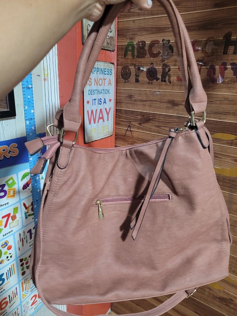 Jovanni Two way Bag (Category: Luxury Bags & Wallets) located in Manila. Submitted by chinfajura (Listing ID 1291252310, Image 3). Description: Jovanni bag can be used as sling bag or shoulder bag. Complete accessories. In a very good condition. No issue. Many pockets and compartment..