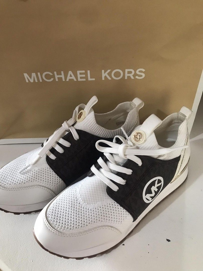 Michael Kors Dash knitted low-top sneakers (Category: Sneakers) located in Muntinlupa City. Submitted by MrsJay (Listing ID 1291233265, Image 2). Description: size 7 brand new actual pic posted no box rfs: wrong size padala lng.