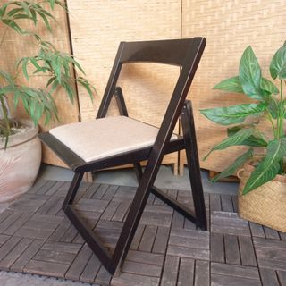 Minimalist solid wood padded folding chair