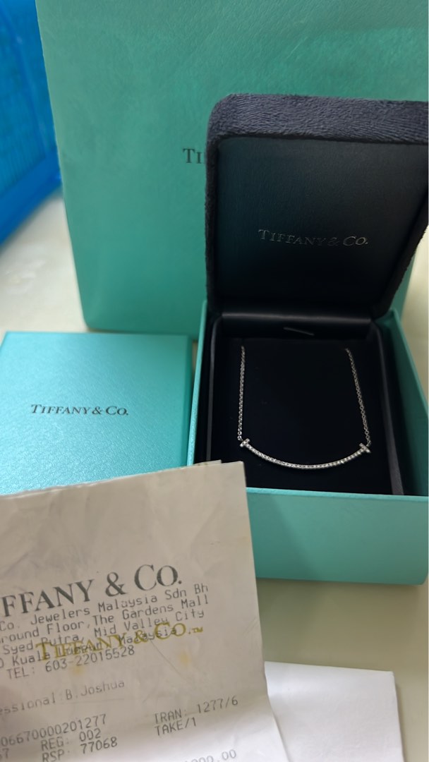 Tiffany Co Smile Pendont in white gold with diamonds