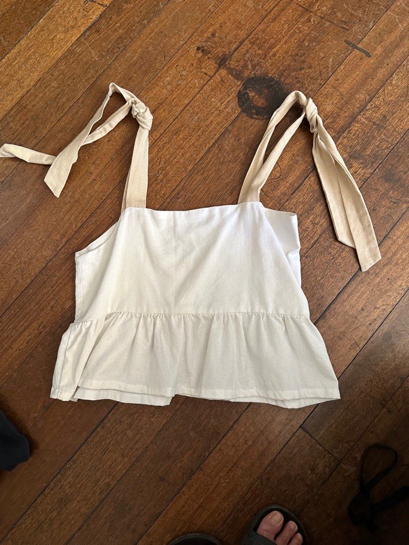 White and beige tie top (Category: Sleeveless) located in Quezon City. Submitted by krishagee (Listing ID 1291229731, Image 1). Description: worn once.