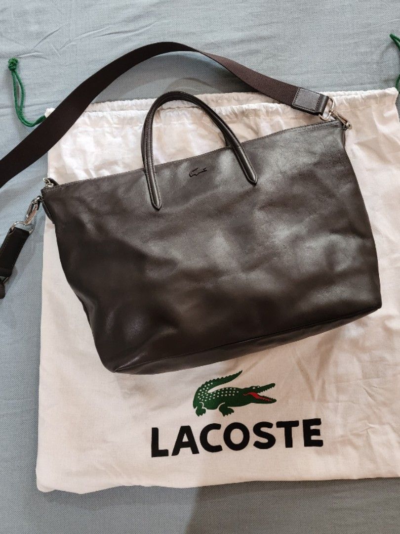 Lacoste Leather Tote Crossbody Bag (Category: Luxury Bags & Wallets) located in Quezon City. Submitted by jas.dc (Listing ID 1291390847, Image 1). Description: Like New Lacoste Cow Leather Tote/crossbody bag Dark Brown 11" Height Width 14" bottom, top zipper 15" Depth 6".