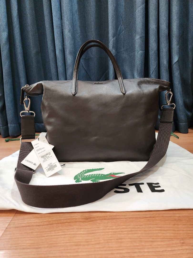 Lacoste Leather Tote Crossbody Bag (Category: Luxury Bags & Wallets) located in Quezon City. Submitted by jas.dc (Listing ID 1291390847, Image 2). Description: Like New Lacoste Cow Leather Tote/crossbody bag Dark Brown 11" Height Width 14" bottom, top zipper 15" Depth 6".
