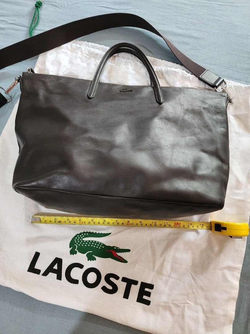 Lacoste Leather Tote Crossbody Bag (Category: Luxury Bags & Wallets) located in Quezon City. Submitted by jas.dc (Listing ID 1291390847, Image 3). Description: Like New Lacoste Cow Leather Tote/crossbody bag Dark Brown 11" Height Width 14" bottom, top zipper 15" Depth 6".