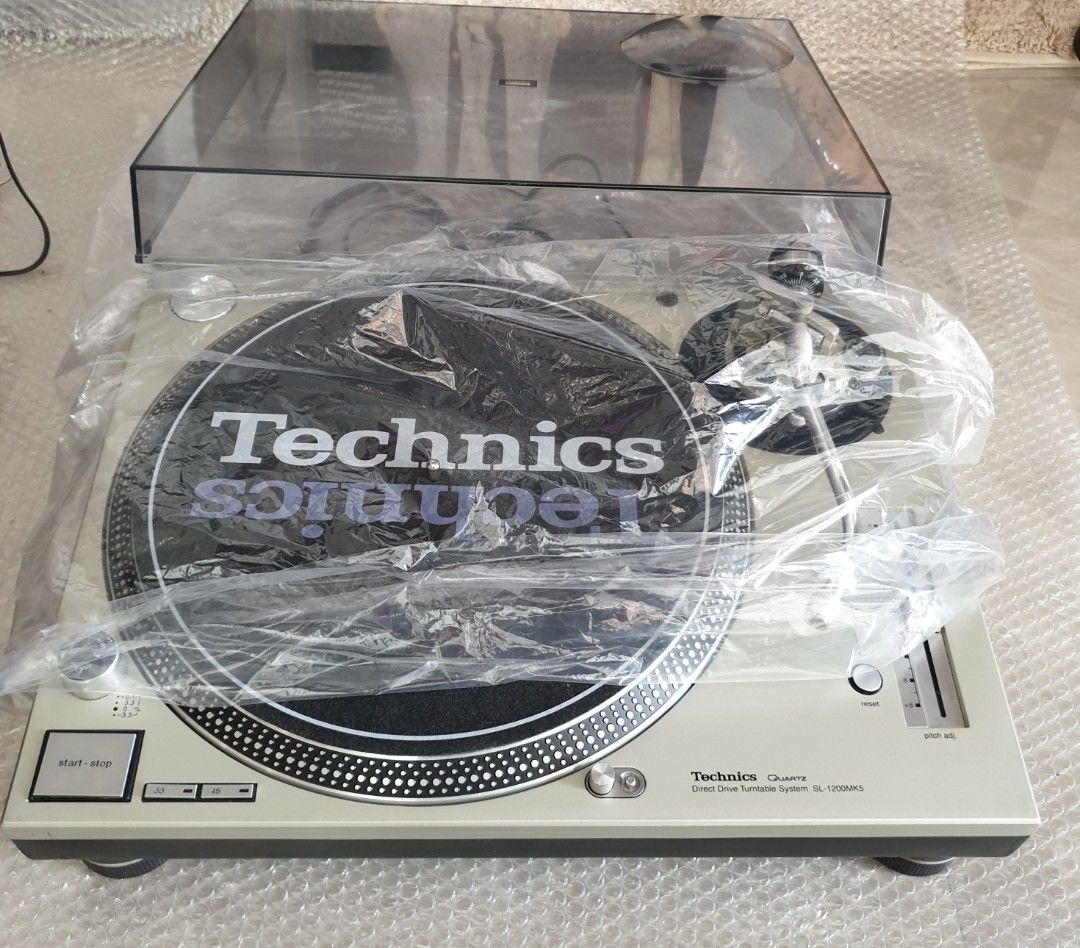 Technics SL-1200MK5 Direct Drive Turntable (Category: Soundbars, Speakers & Amplifiers) located in Manila. Submitted by racz03 (Listing ID 1291395927, Image 2). Description: New Arrival... Technics SL-1200MK5 Direct Drive Turntable Nearmint Condition Tested, in Excellent Working Condition. it Comes With Slipmat, Rubber mat, 45rpm adapter & Dustcover. With Original Technics High Fidelity Rca Cord..