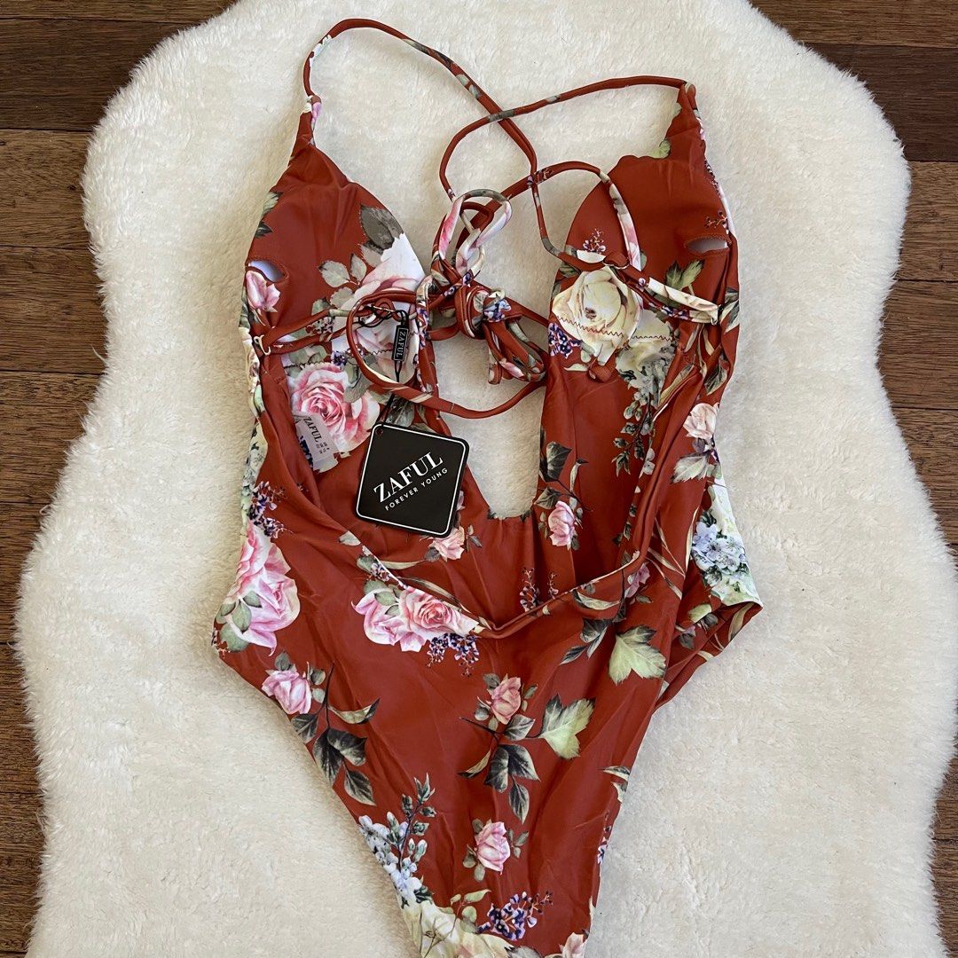 Zaful one piece bikini in rust floral (Category: Bikinis & Swimsuits) located in Manila. Submitted by avery._ (Listing ID 1291439505, Image 2). Description: Rfs wrong size.