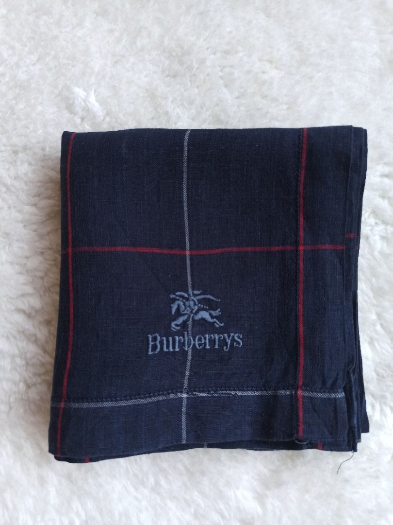Burberrys unisex hanky (Category: Luxury Accessories) located in Mati. Submitted by surkayconsumergoodstraiding (Listing ID 1291659434, Image 3). Description: Burberrys handkerchief. Unisex From Japan box. buy 3 handkerchiefs to get 1 free scarf. Embriode brand name and logo With its dark color, this hanky is ideal as stains or dirt won't be easily visible, ensuring a neat appearance even after multiple uses..