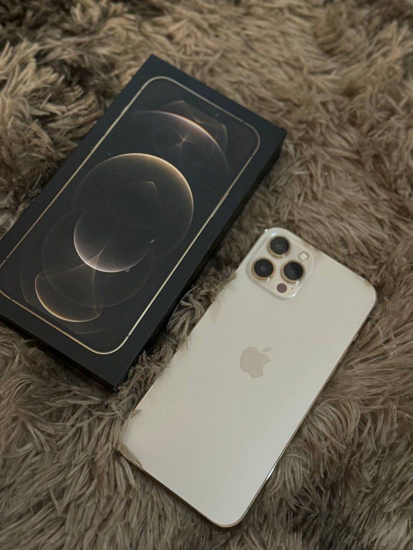 iPhone 12 Pro Max (Category: iPhone 12 Series) located in Caloocan City. Submitted by nbapop.buysell (Listing ID 1291687639, Image 1). Description: iPhone 12 Pro Max Bought April 2021 256gb gold 82% battery life Inclusions: all my phone cases, box, wired apple earphones, cord.