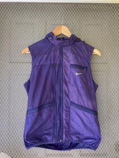 Nike 6 pocket vest with foldable hood