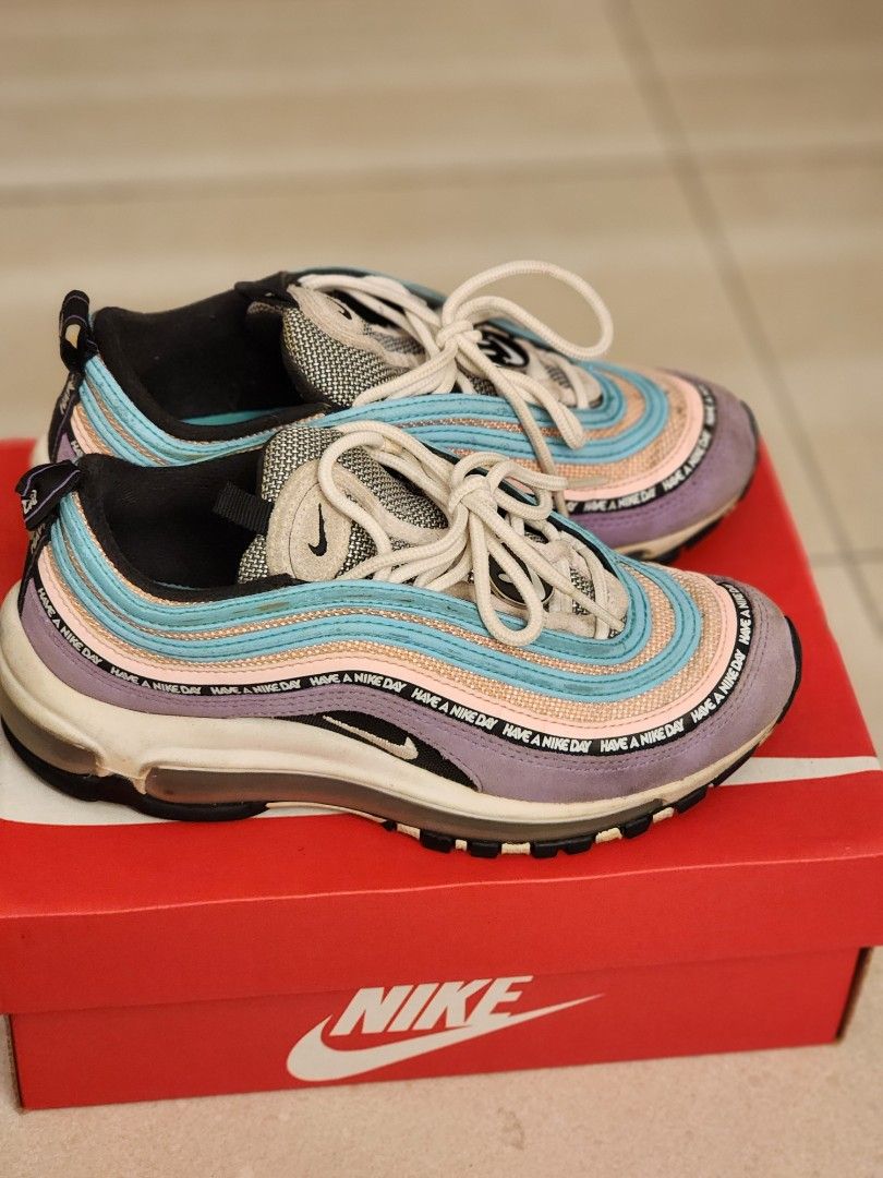 Have a nike day air max 97 on feet top