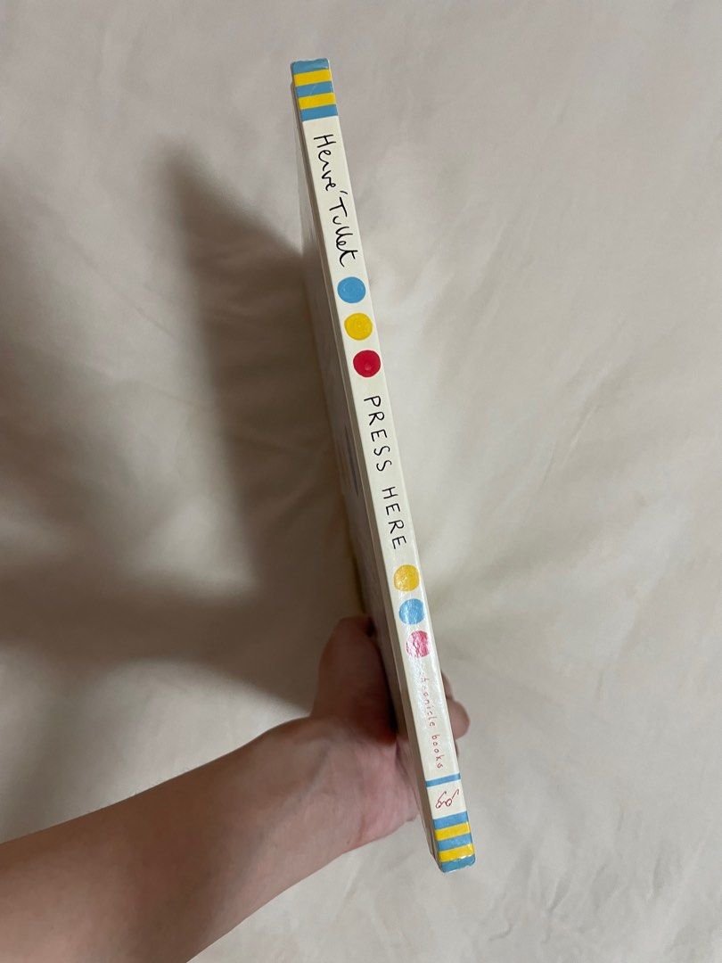 Press Here by Herve Tullet Hardcover Book (Category: Storybooks) located in Pasig City. Submitted by happyen (Listing ID 1291717662, Image 3). Description: Minor shelf wear on the cover Complete pages, no folds, no writings inside This hardcover version is P927 in fully booked.