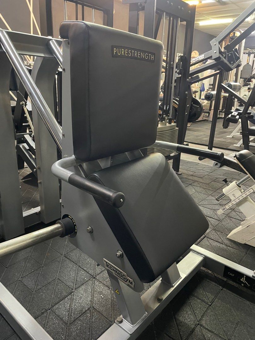 Technogym Italy pure strength 45 degrees seated calf raise press gym