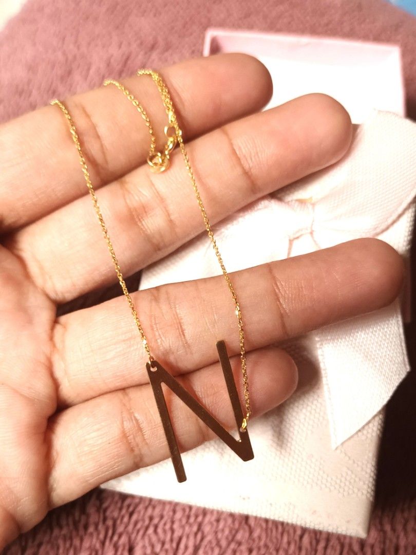 18k Saudi Gold Initial Necklace Letter N (Category: Necklaces) located in Lucena. Submitted by Goldrich (Listing ID 1291721827, Image 2). Description: 18k Saudi Gold Center necklace Real gold and pawnable 16 inches.