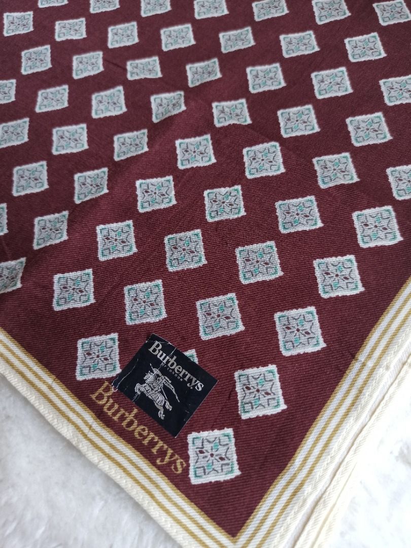 Burberrys Vintage hanky (Category: Luxury Accessories) located in Mati. Submitted by surkayconsumergoodstraiding (Listing ID 1291743357, Image 3). Description: Burberrys handkerchief. for men From Japan box. buy 3 handkerchiefs to get 1 free scarf. With its dark color, this hanky is ideal as stains or dirt won't be easily visible, ensuring a neat appearance even after multiple uses..
