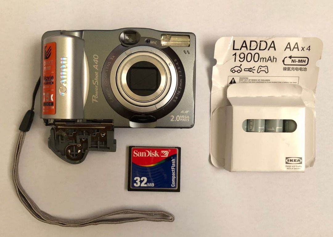 Canon PowerShot A40 Vintage Digital Camera Digicam (Category: Cameras) located in Arayat. Submitted by josepdg (Listing ID 1291803839, Image 2). Description: 2MP CCD Digital Camera. What's Included; -Camera with Strap -4*AA Ikea Ladda NiMH Rechargeable Batteries (brand new) -32MB CF Card *This is a used item so please expect some scratches, scuffs, and imperfections on the camera body. There is some minor corrosion on the battery terminal but has