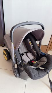 Doona Infant Car Seat & Stroller (Free sunshade & Leather Handle Cover)
