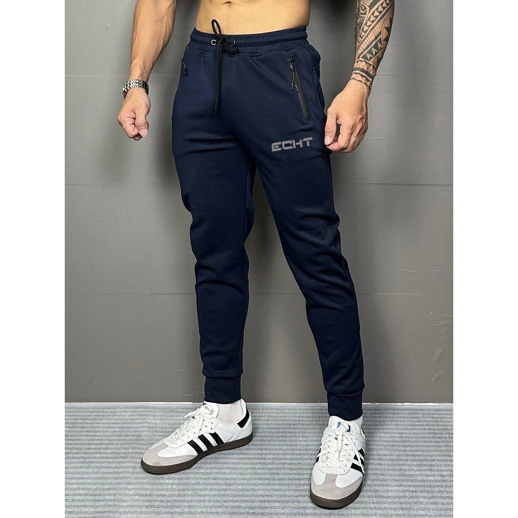 Authentic GymShark crest jogger, Men's Fashion, Bottoms, Joggers on  Carousell