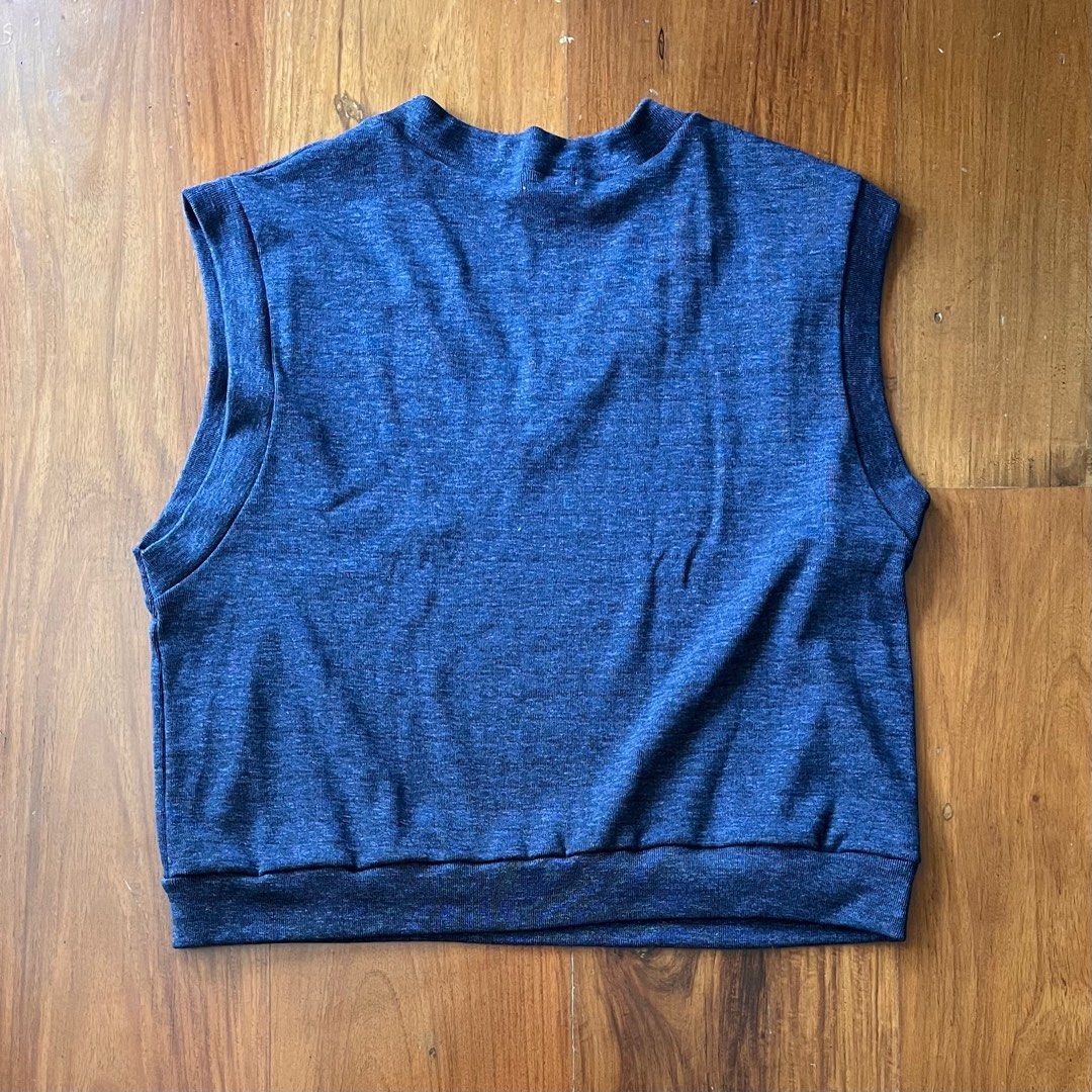 Korean Sweater Vest (Category: Coats, Jackets and Outerwear) located in Muntinlupa City. Submitted by _sbstnm (Listing ID 1291841010, Image 3). Description: Korean random brand oversized sweater vest in dark speckled blue Tag size: No size tag Actual measurements (inches, laid flat) Width: 26 Length: 26 MOP: Gcash or BPI transfer only Shipping: Lalamove, GrabExpress, J&T Express parcel (fees to be shouldered by buyer).