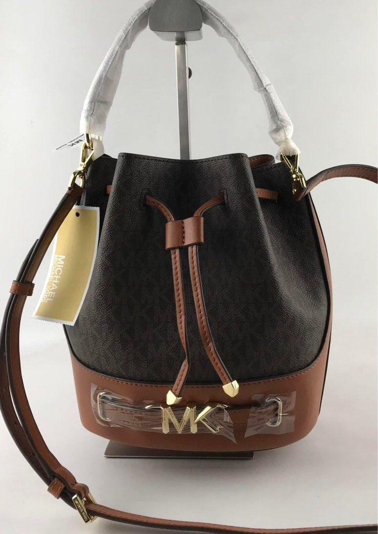 MK bucket bag (Category: Cross-body Bags) located in Manila. Submitted by gff.daily_flower (Listing ID 1291889834, Image 2). Description: With tag gift receipt dustbag and paperbag.