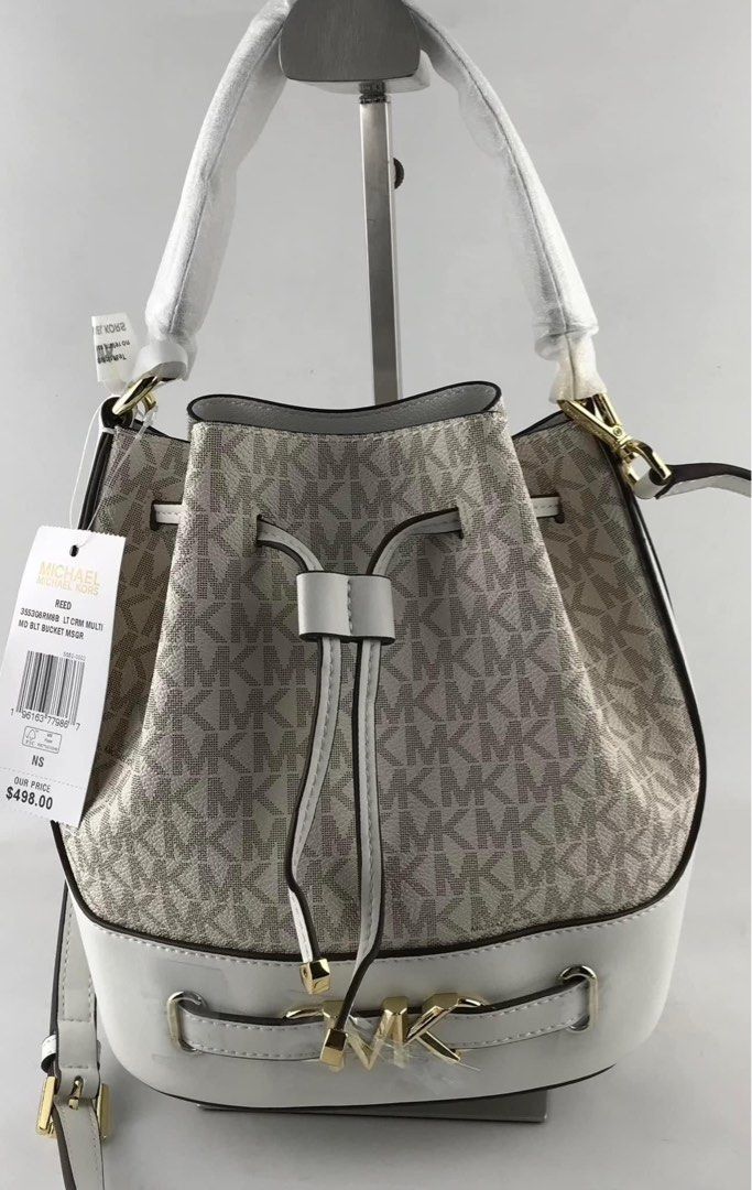 MK bucket bag (Category: Cross-body Bags) located in Manila. Submitted by gff.daily_flower (Listing ID 1291889834, Image 1). Description: With tag gift receipt dustbag and paperbag.