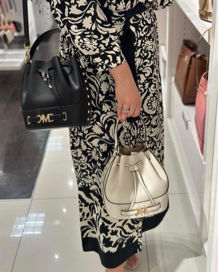 MK bucket bag (Category: Cross-body Bags) located in Manila. Submitted by gff.daily_flower (Listing ID 1291889834, Image 3). Description: With tag gift receipt dustbag and paperbag.