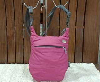 pink pacsafe sling