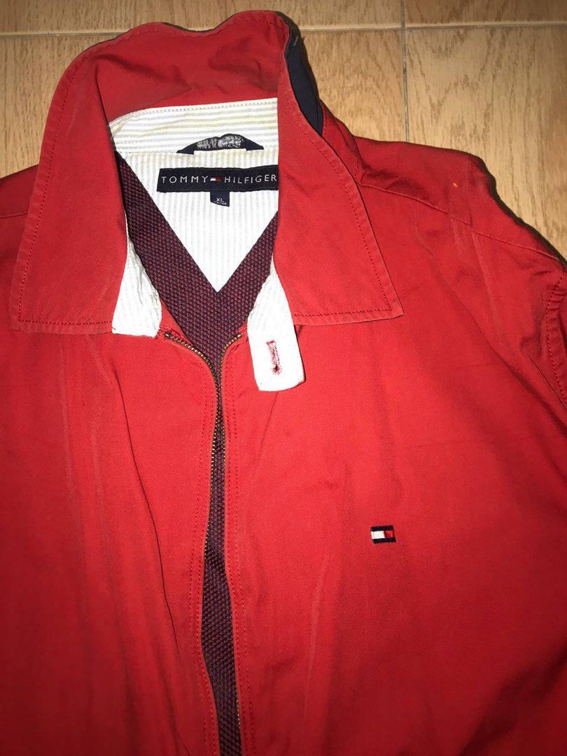 tommy hilfiger jacket (Category: Coats, Jackets and Outerwear) located in Singapore. Submitted by obsidi4n (Listing ID 1291864708, Image 2). Description: bought from retromania popup store previously, but didn't have a chance to wear it vintage, meaning there's stains on the inside collar and sleeves, but exterior looks almost new as shown thick windbreaker material, there's inner pockets inside the jacket .