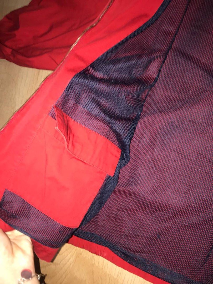 tommy hilfiger jacket (Category: Coats, Jackets and Outerwear) located in Singapore. Submitted by obsidi4n (Listing ID 1291864708, Image 4). Description: bought from retromania popup store previously, but didn't have a chance to wear it vintage, meaning there's stains on the inside collar and sleeves, but exterior looks almost new as shown thick windbreaker material, there's inner pockets inside the jacket .