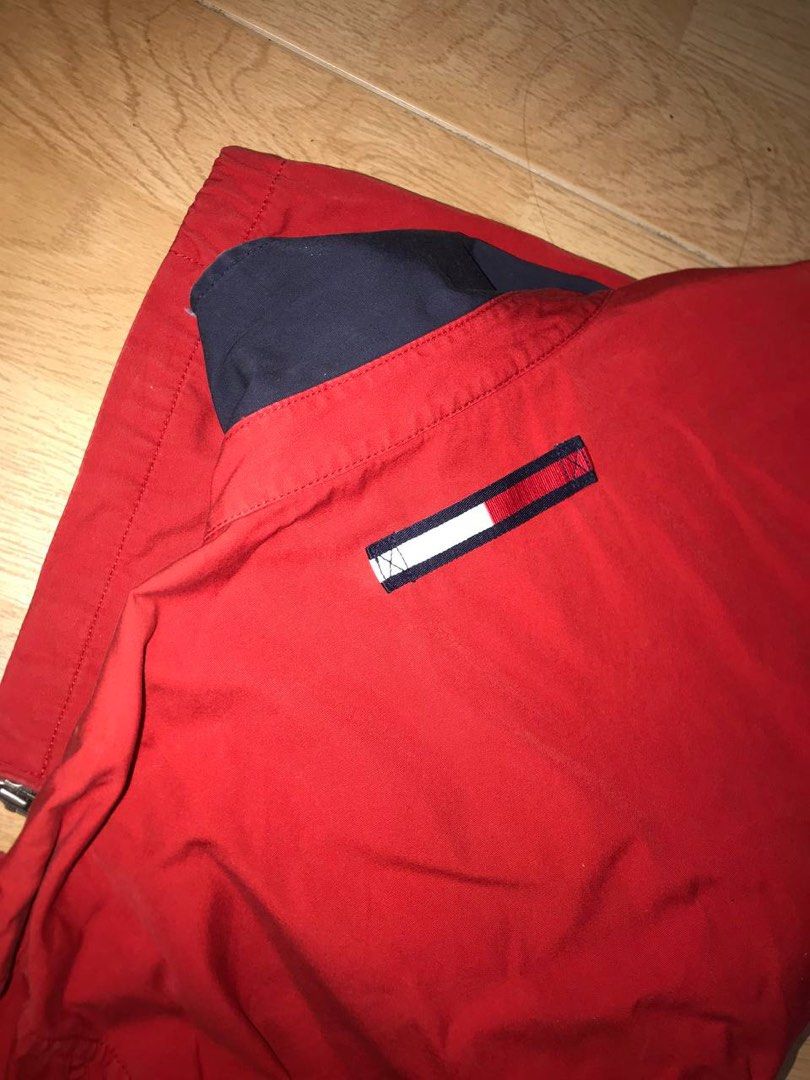 tommy hilfiger jacket (Category: Coats, Jackets and Outerwear) located in Singapore. Submitted by obsidi4n (Listing ID 1291864708, Image 3). Description: bought from retromania popup store previously, but didn't have a chance to wear it vintage, meaning there's stains on the inside collar and sleeves, but exterior looks almost new as shown thick windbreaker material, there's inner pockets inside the jacket .