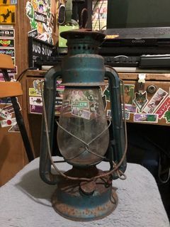 Very old gas lamp heavily used for display only