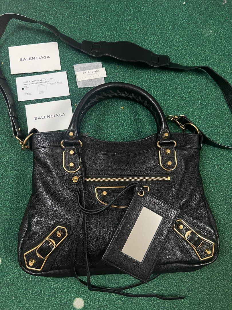 Balenciaga Black Town in Gold (Category: Luxury Bags & Wallets) located in Quezon City. Submitted by goodasnew303 (Listing ID 1292020683, Image 1). Description: Original Balenciaga Black Town in Gold (Small) Bought 2019 In good condition W/ dust bag; no box.