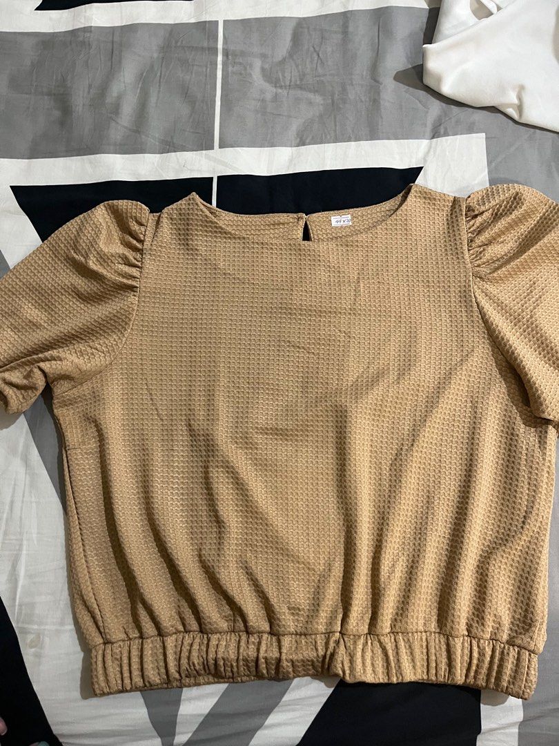Khaki Pop sleeves blouse (Category: Blouses) located in Pasig City. Submitted by aac2021 (Listing ID 1292012394, Image 3). Description: RFS : Decluttering Dimes : 44 inches x 20 inches Can fit from medium to large, with waistband .