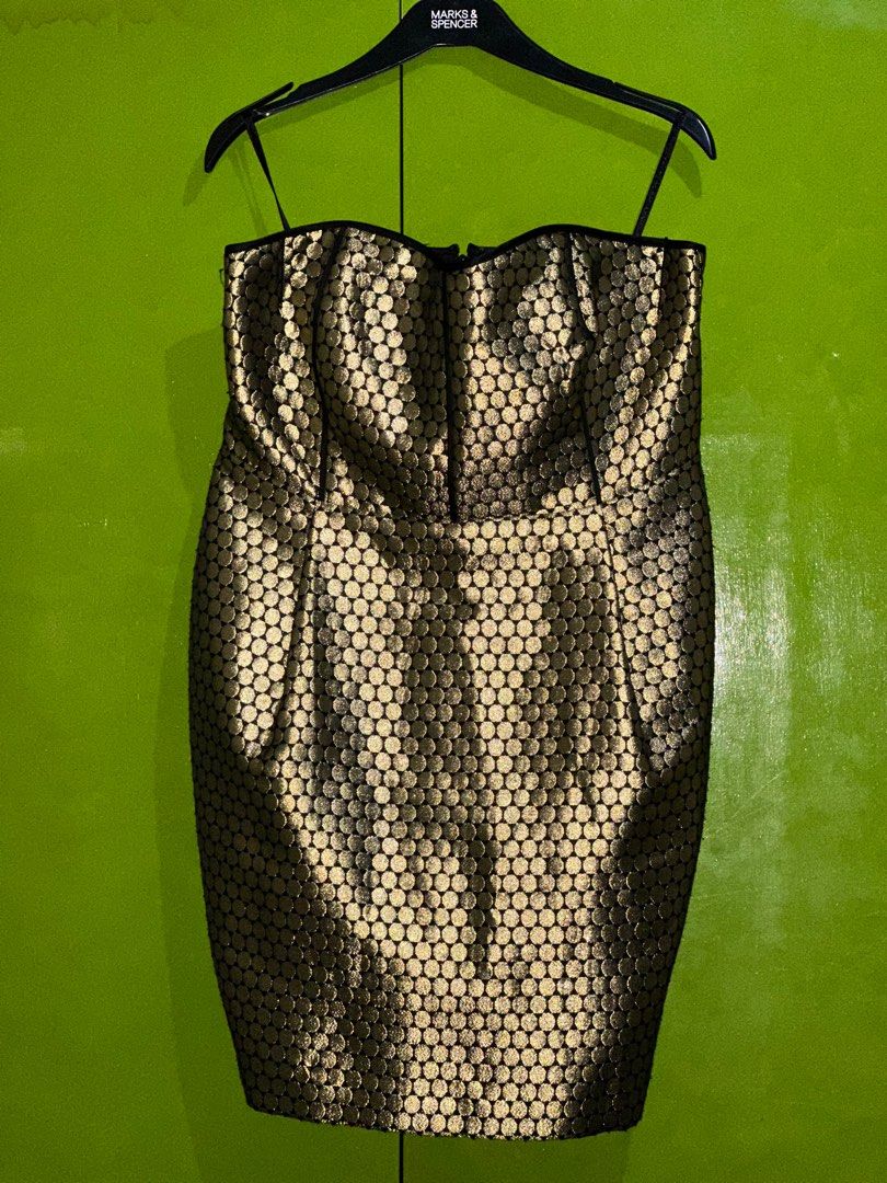 Marks & Spencer Gold Strapless Dress (Category: Dresses) located in Subic. Submitted by lishbentables (Listing ID 1292038816, Image 2). Description: Marks & Spencer Limited Edition US Size 14 Comes with free M&S Hanger and Paper Bag RFS: Big on me (Only size available on the rack) Never used kasi no event to use it to + Not my style anymore.
