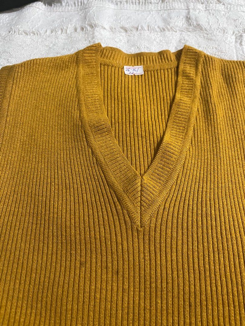 Mustard sleeveless ribbed knit (Category: Sleeveless) located in Pasig City. Submitted by aac2021 (Listing ID 1292022485, Image 1). Description: RFS : Decluttering Dimes : 26 - 36 inches x 23 inches Can fit from small to medium .