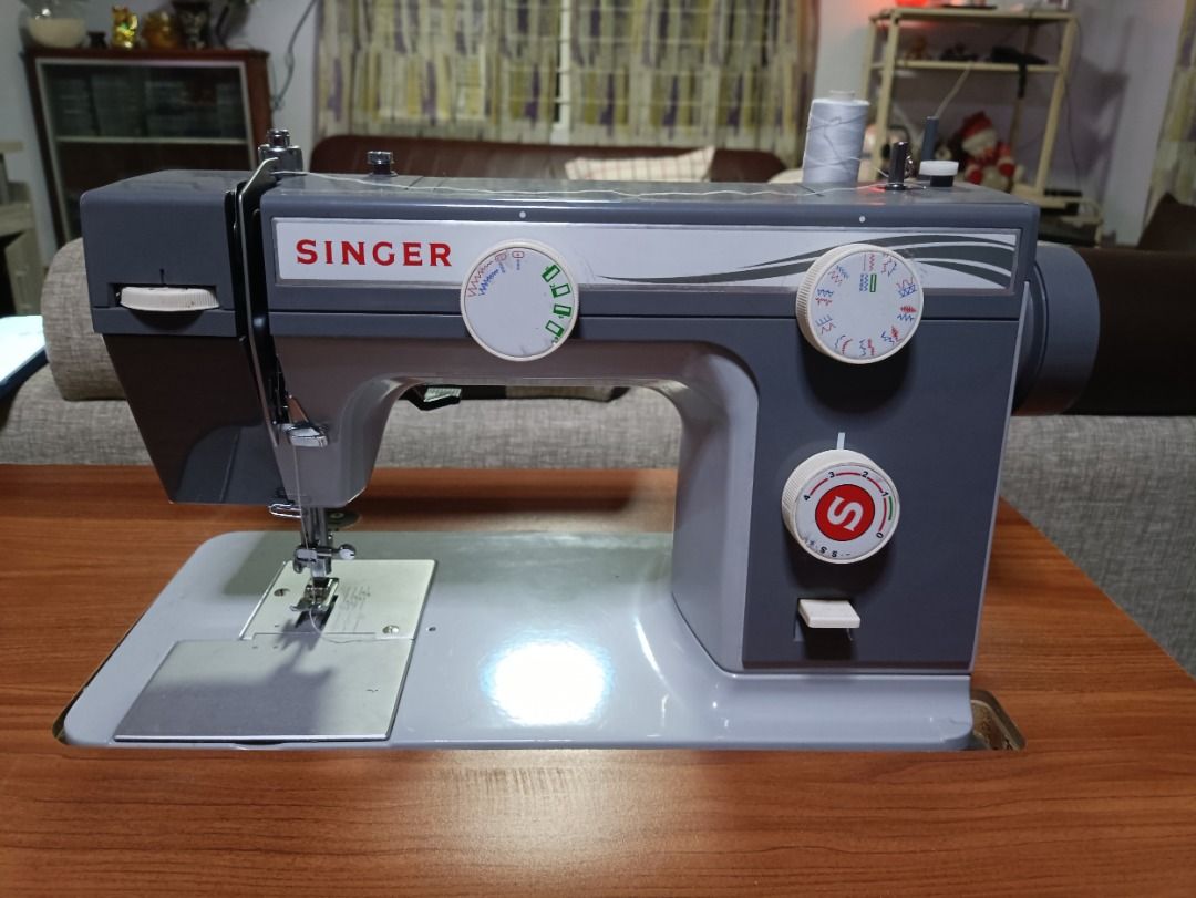 SINGER 984 WITH ELECTRIC PEDAL AND SEWING TABLE (Category: Other Home Furniture) located in Quezon City. Submitted by abubot.co (Listing ID 1292020447, Image 1). Description: FOR SALE SINGER 984 100% Guaranteed Original Negotiable - message me Electric and manual use, Bought brand new sa authorized seller talaga, seldom use, 5 times used only and practice lang hindi matagalan ginagamit since hindi talaga mananahi. binili lang po kasi nagandahan p