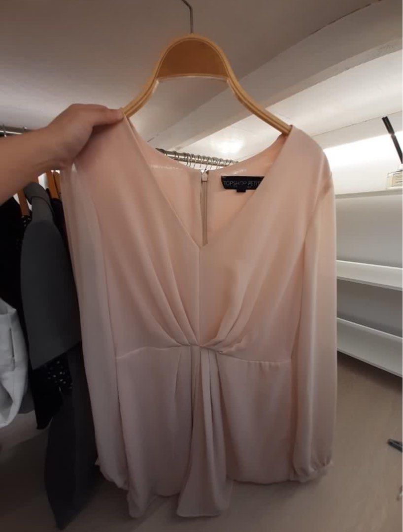 Topshop Peach Romper (Category: Rompers) located in Muntinlupa City. Submitted by downtodeclutter (Listing ID 1291984446, Image 2). Description: - slightly used - good as new - light pink/ peach in color - fits small to medium - great for parties also.