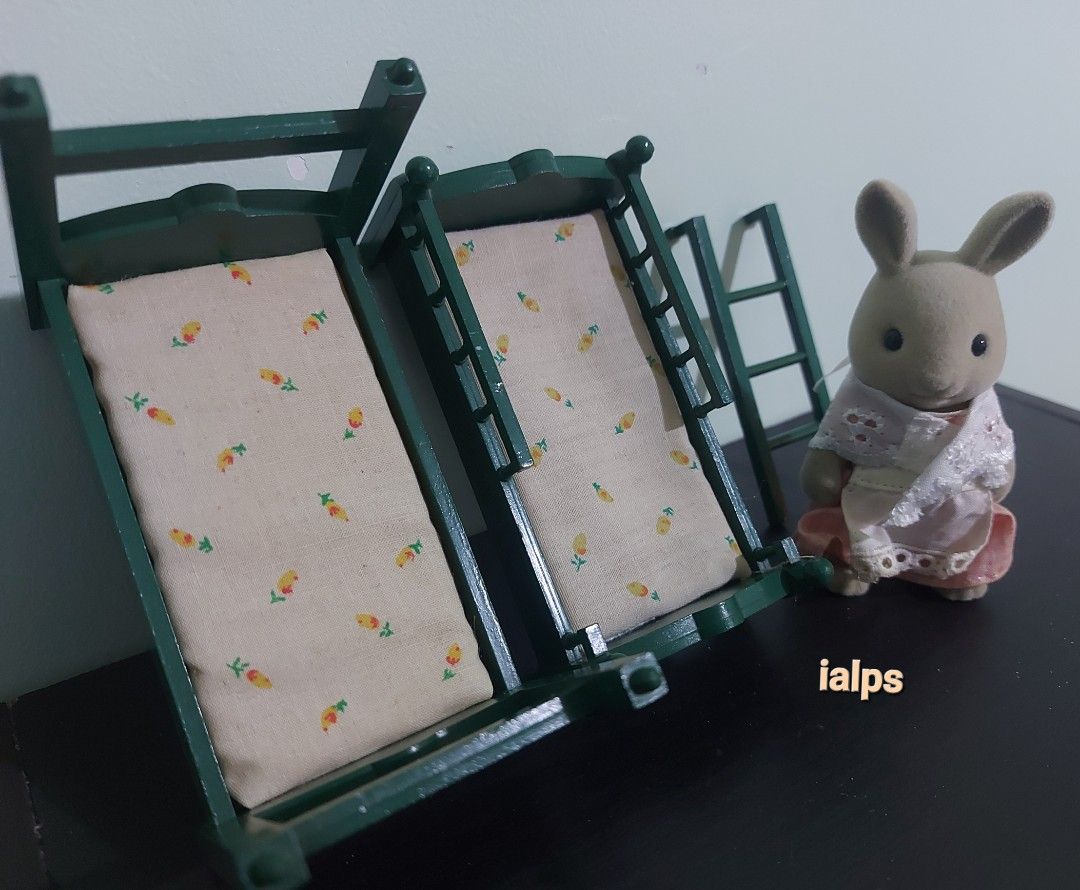 1987 Vintage Sylvanian Families Double Deck Bed with Ladder (Category: Vintage Collectibles) located in Angono. Submitted by lpsflover (Listing ID 1296128497, Image 3). Description: With original mattress. Complete with ladder. No paint rubs nor faded parts. Matte in actual. In good condition but manage your expectations on used items. Payment via BPI/BDO. Shipping via Lalamove..