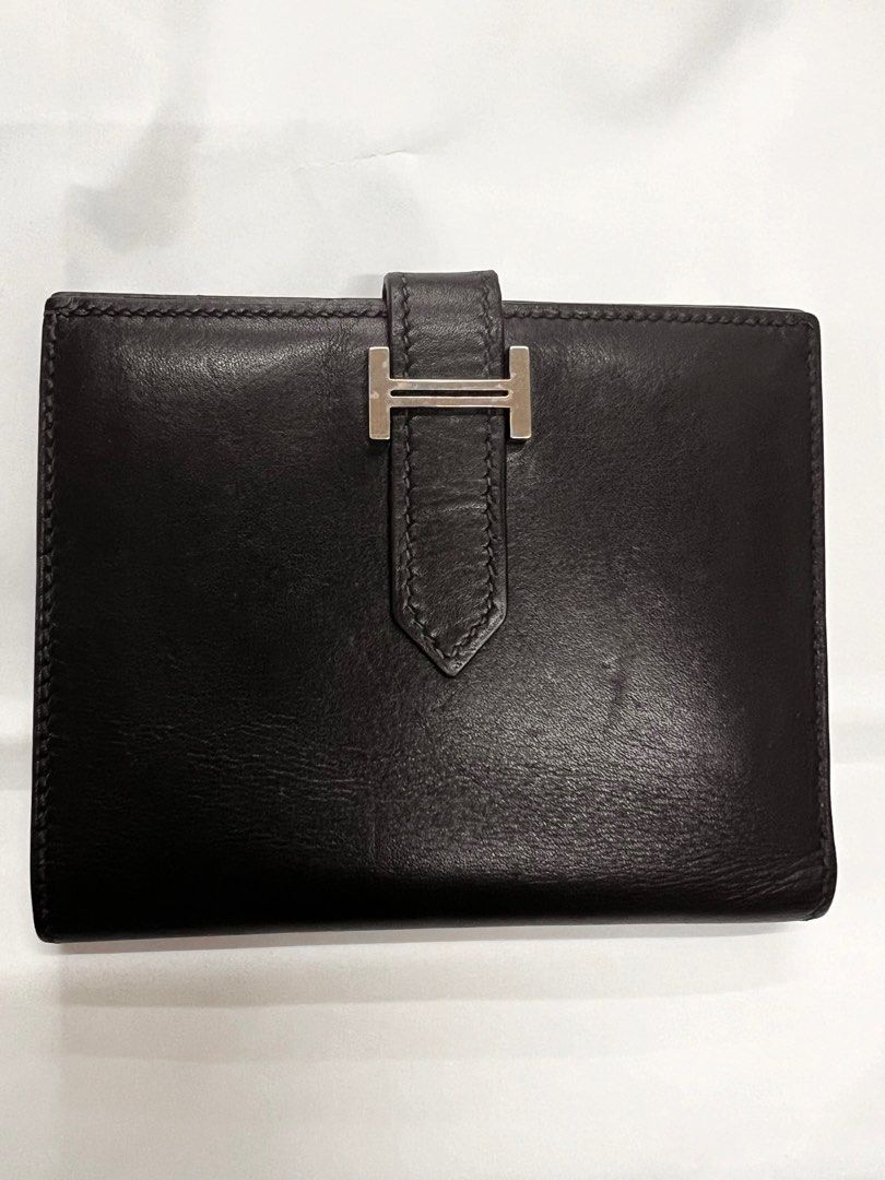 Authentic Hermes Bearn Black Leather Wallet (Category: Luxury Bags & Wallets) located in Cagayan de Oro. Submitted by riggstuffs (Listing ID 1296176686, Image 1). Description: ➡️ Guaranteed Authentic Hermes Bearn Black leather wallet Made in France With code Light scuffs or signs of use on the exterior area Calf leather material Over all Condition: 9/10 Dimension : H 7.5cmx W 10cm Disclaimer : Riggstuffs is not associated or affiliated with the b