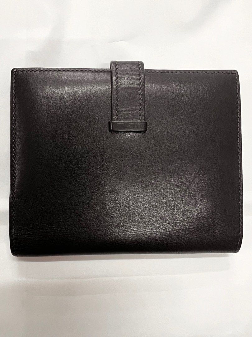 Authentic Hermes Bearn Black Leather Wallet (Category: Luxury Bags & Wallets) located in Cagayan de Oro. Submitted by riggstuffs (Listing ID 1296176686, Image 2). Description: ➡️ Guaranteed Authentic Hermes Bearn Black leather wallet Made in France With code Light scuffs or signs of use on the exterior area Calf leather material Over all Condition: 9/10 Dimension : H 7.5cmx W 10cm Disclaimer : Riggstuffs is not associated or affiliated with the b